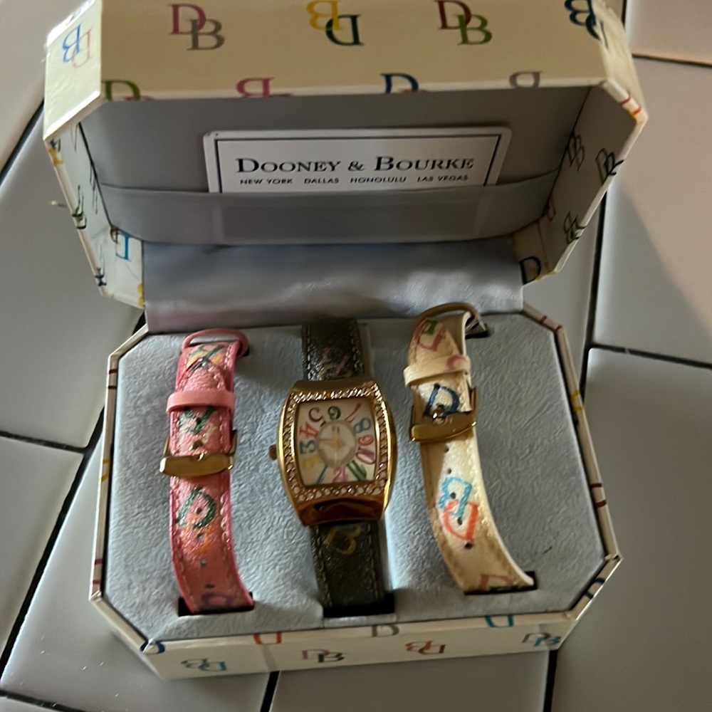 Dooney & Bourke watch with 3 changeable wristbands